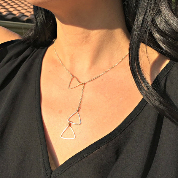 sliding triangles necklace on pretty model